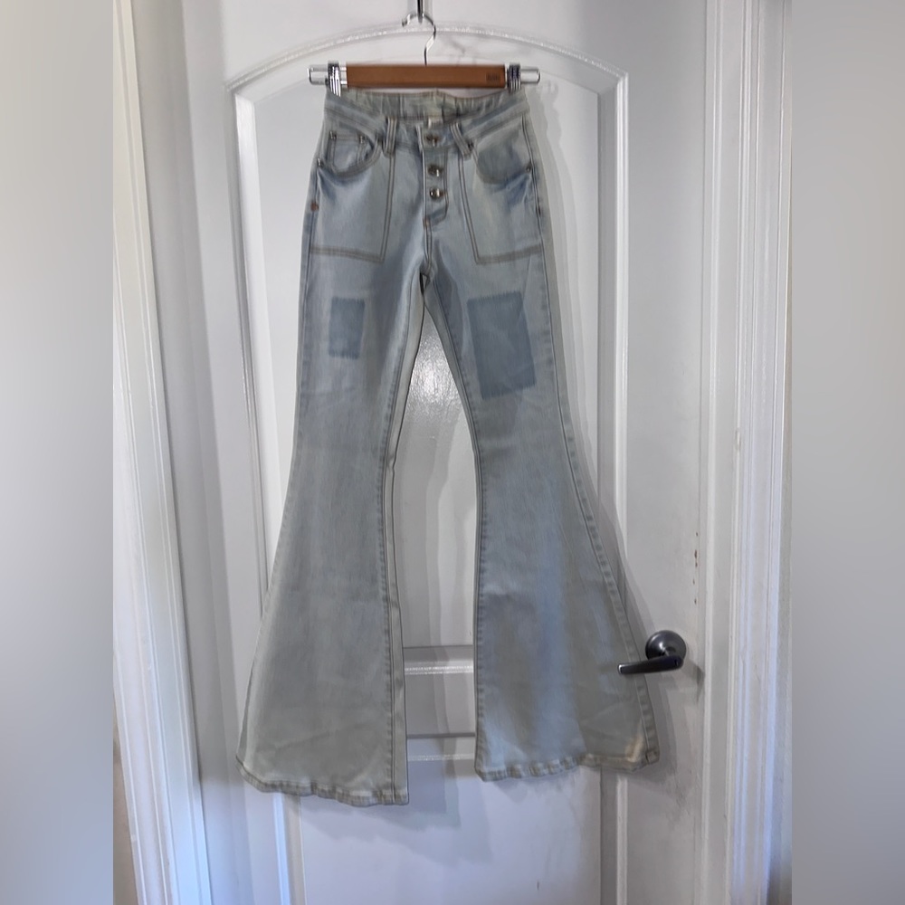 Some days Lovin Patchwork Faded Flare Bottom  jeans.